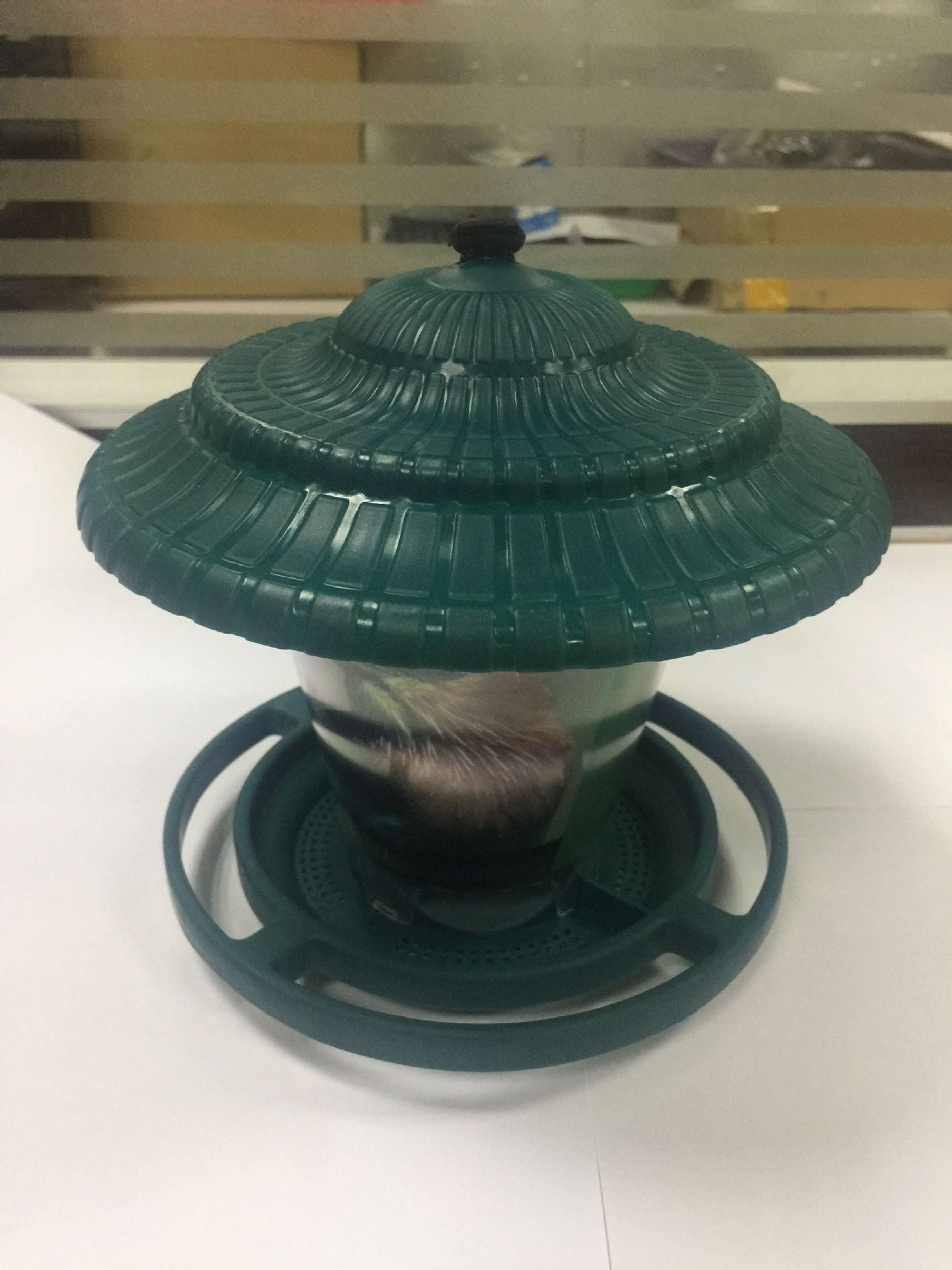 Plastic transparent bird feeder